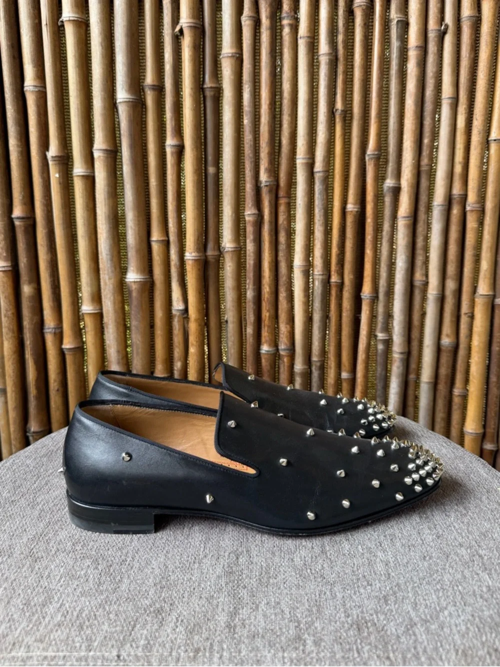 CHRISTIAN LOUBOUTIN men’s spiked leather loafers.